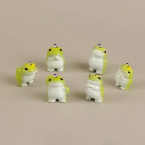 Lot complet de six breloques grenouille vertes et blanches aux poses variées
